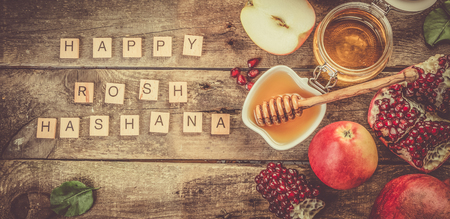 Rosh hashana jewish holiday concept apples honey pomegranate Stock Photo