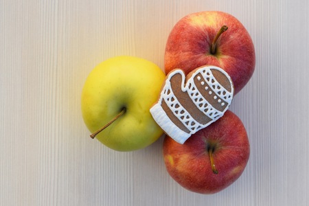 Gingerbread glove with colorful apples Stock Photo