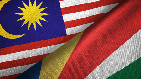 Malaysia and seychelles two folded flags together