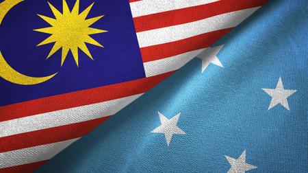 Malaysia and micronesia two folded flags together