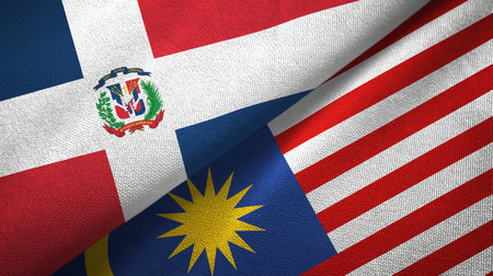 Dominican republic and malaysia two flags textile cloth fabric texture Stock Photo