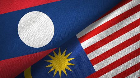 Laos and malaysia two flags textile cloth fabric texture