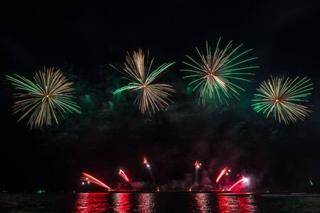 Beautiful firework display for celebration over the sea