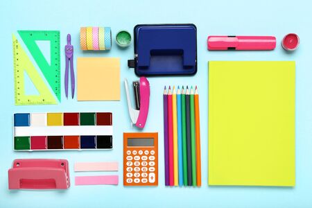 School supplies on blue background