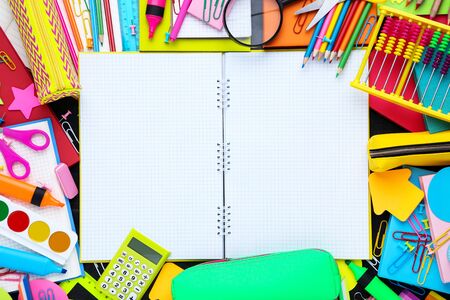 Different school supplies with blank sheet of paper Stock Photo