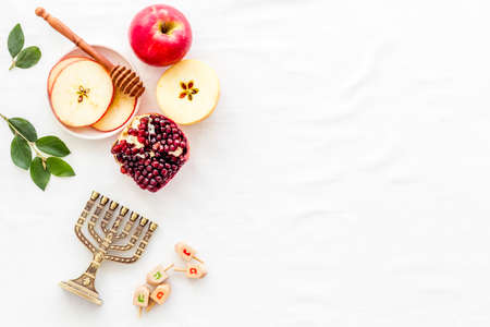 Rosh hashana jewish new year concept apple and honey on the table top view