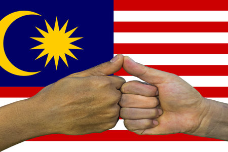 Flag of malaysia integration of a multicultural group of young people