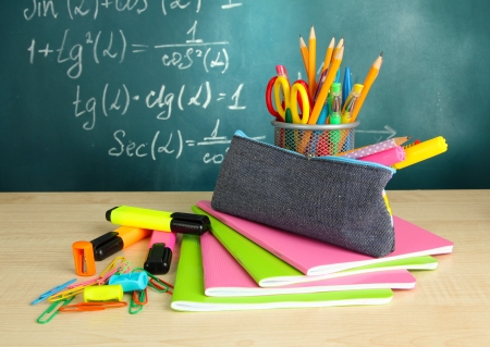 Back to school blackboard with pencil box and school equipment on table Stock Photo