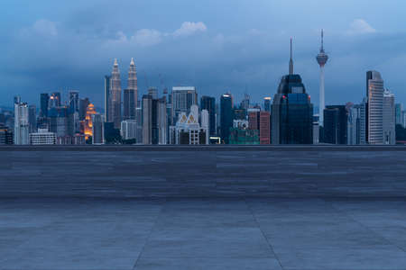 Panoramic kuala lumpur skyline view concrete observatory deck on rooftop night asian corporate and residential lifestyle financial city downtown real estate product display mockup empty roof