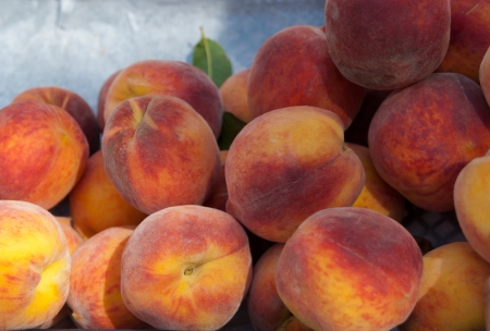 Fresh organic peaches at a market