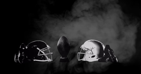 Image of smoke with american football equipment with ball sport and celebration concept digitally generated image Stock Photo