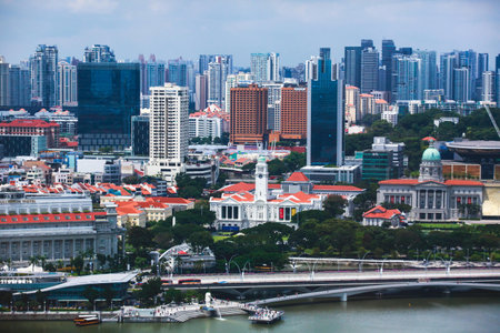 Beautiful super wide angle summer aerial view of singapore with skyline bay and scenery beyond the city seen from the observation deck