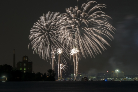 Fireworks over detroit river Stock Photo