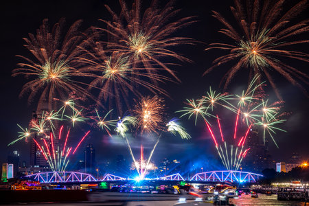 Beautiful fireworks at chaopraya river memorial bridge light up with fireworks event show â€˜vijit chao phrayaâ€™ bangkok thailand Stock Photo