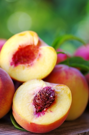 Sliced peaches on table Stock Photo