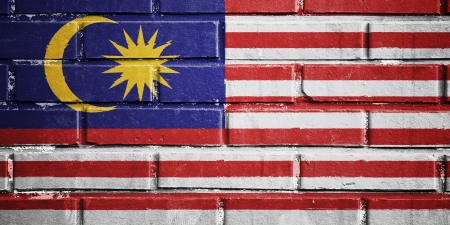 Malaysia flag on texture brick wall