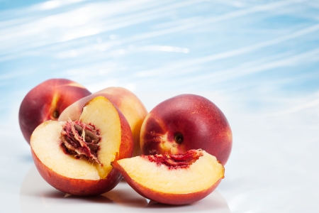 Peaches on abstract background