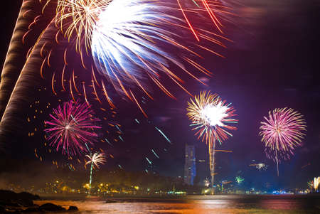 Beautiful fireworks celebrating new year on patong beach thailand