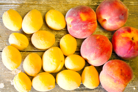 Ripe sweet peaches and apricots Stock Photo