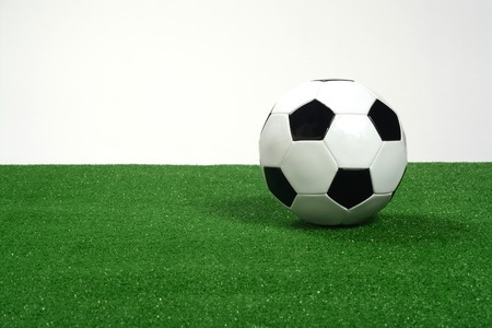 Soccer ball on artificial grass