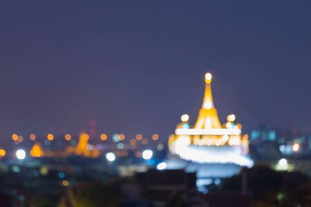 Night view golden mountain temple abstract blurred bokeh lights thailand landmark