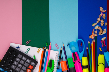 School or office stationery on colorful background back to school frame copy space top view supplies Stock Photo