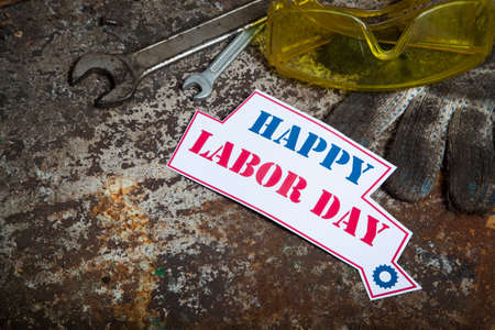 Labor day sign on the rusty background