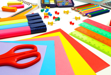 Different school supplies colorful background necessary accessories for study back to school concept