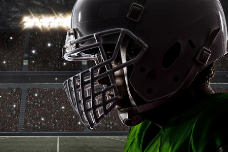 Close up of a football green with a white uniform on a stadium Stock Photo