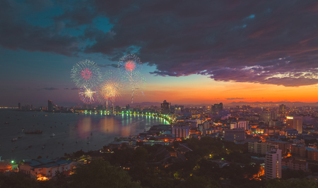 Multicolor fireworks night scene blurred photo pattaya cityscape sea beach view thailand vintage