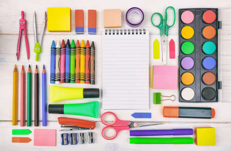 School supplies on white background space for caption Stock Photo