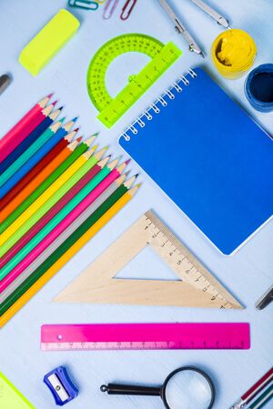 Back to school items for the school on a blue wooden table Stock Photo