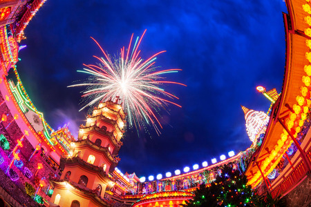 Kek lok si temple light up with firework show Stock Photo