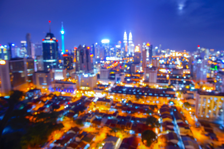 Blur image of kuala lumpur city at night Stock Photo