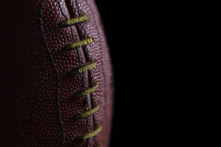 Close up of texture and stitch on american football Stock Photo