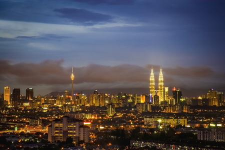 Kuala lumpur city skyline sunset to night scene Stock Photo