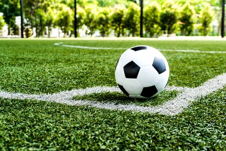 Soccer football on corner kick line of ball and a soccer field football field background texture Stock Photo